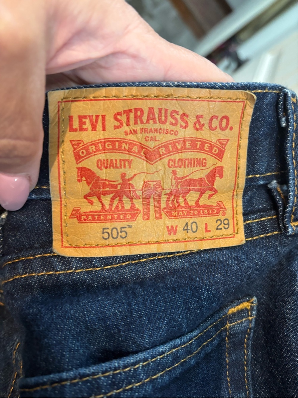 Levi's 505 Straight Men's Jeans in Dark Indigo with Tan Patch